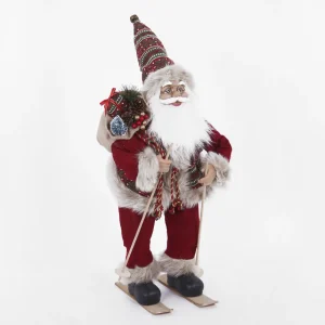 Babbo Natale in piedi su sci con sacco portadoni, in poliresina.