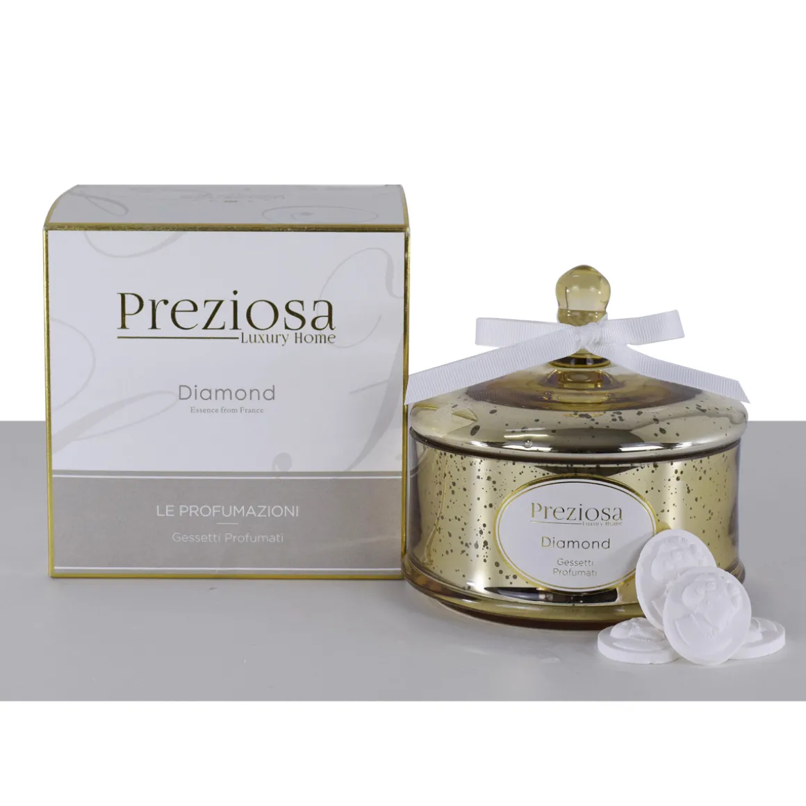 cofanetto_in_vetro_e_dora_0-1.webp Cofanetto in vetro e dorato con gessetti profumati.