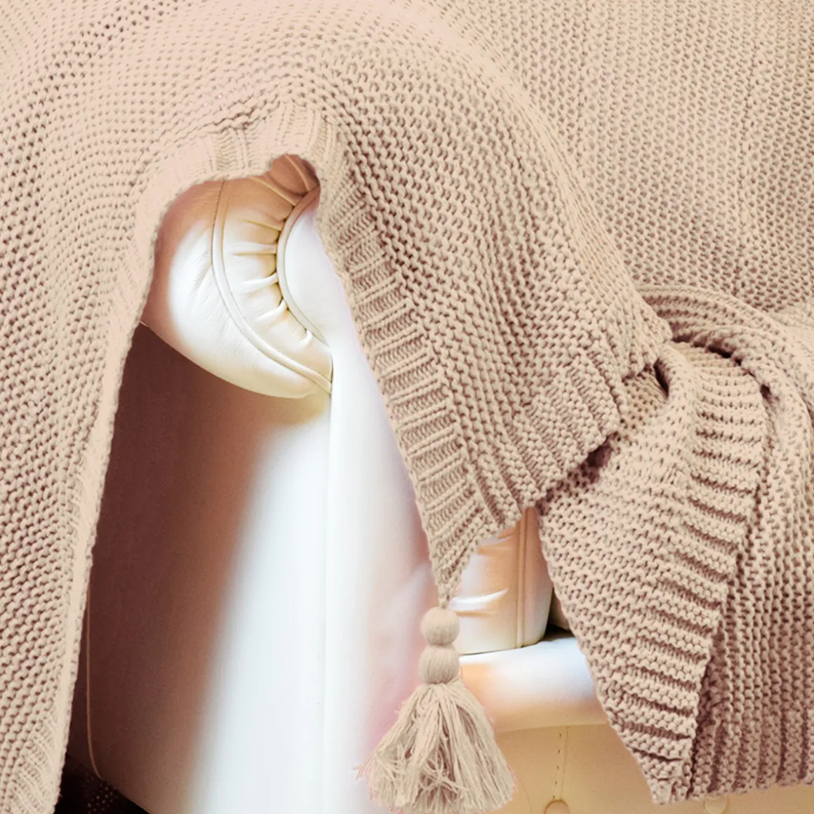 coperta_in_maglia_con_nap_0-1.webp Coperta in maglia con nappe