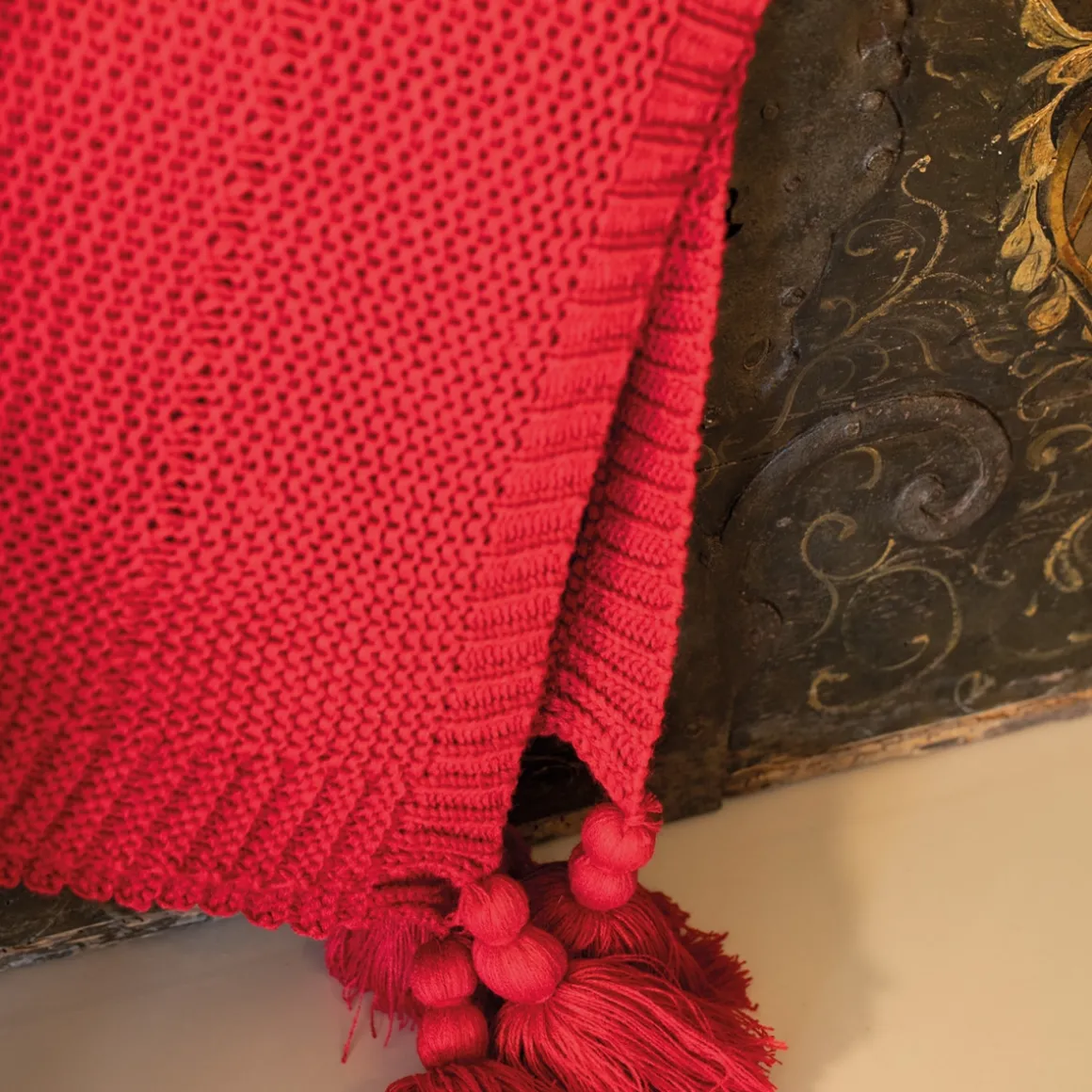 coperta_in_maglia_con_nap_1.webp Coperta in maglia con nappe