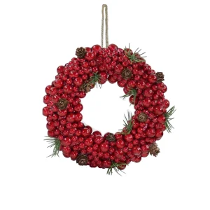 Corona di bacche rosse e pigne